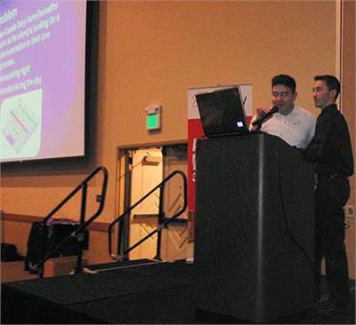 Students Matt Bender and Moises Garcia-Ponce presenting at the conference.